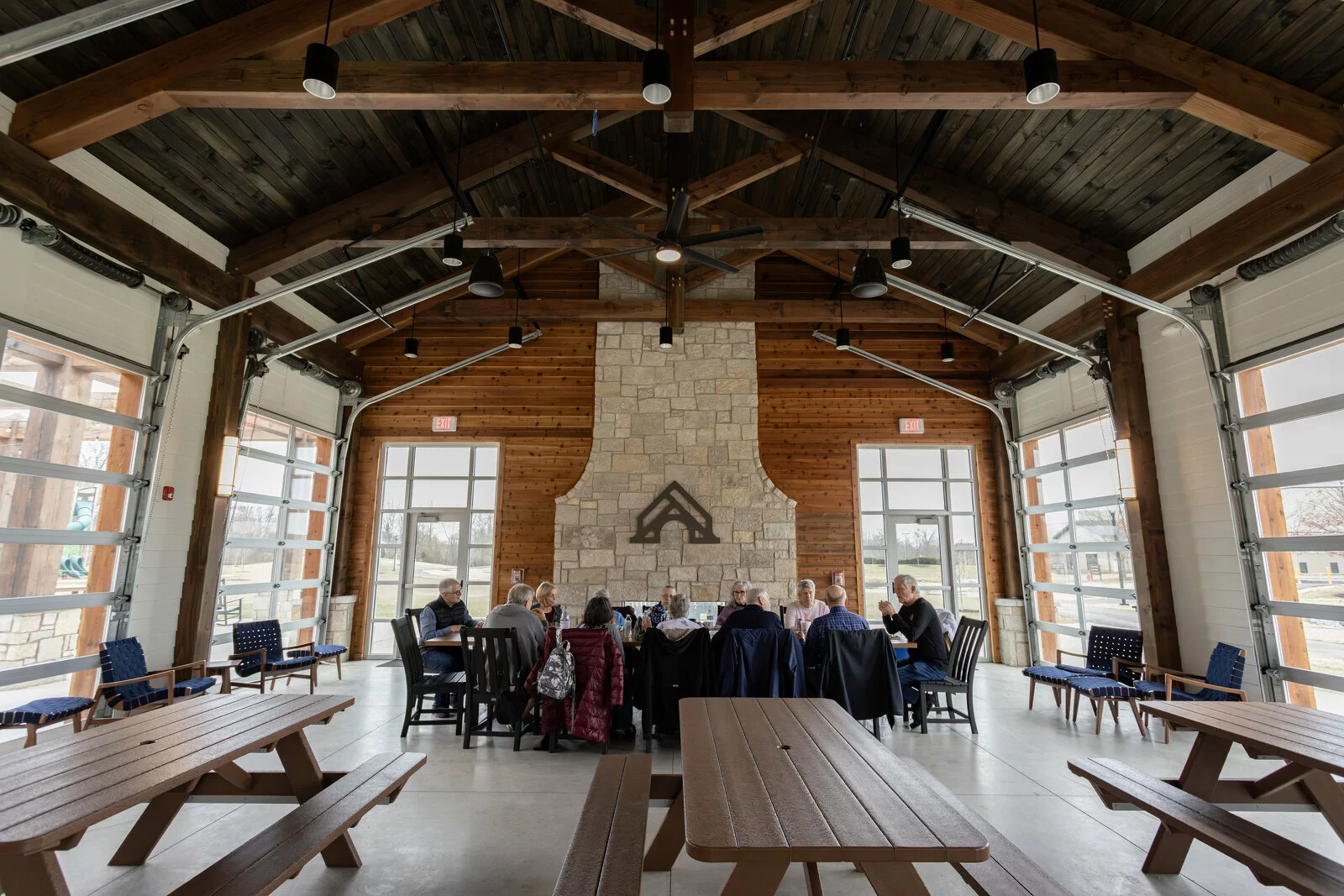 Group of elderly folks in an indoor-outdoor space